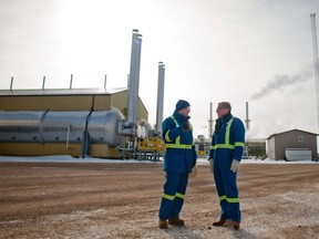 Premier Brad Wall (right) at the official start of operations at Husky Energy Inc.'s Edam East thermal project near Lloydminster on March 1, 2016.