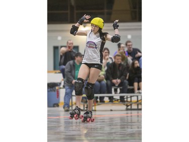 Team White takes on Team Black in a Invitational Scrimmage at the home opener for the Saskatoon Roller Derby League at Archibald Arena on Saturday, April 2nd, 2016.