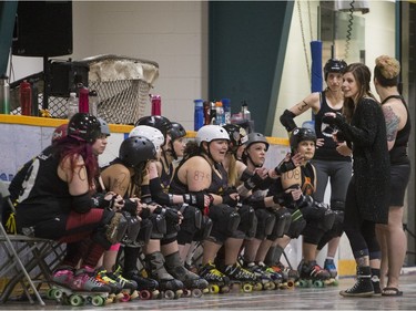 Team White takes on Team Black in a Invitational Scrimmage at the home opener for the Saskatoon Roller Derby League at Archibald Arena on Saturday, April 2nd, 2016.