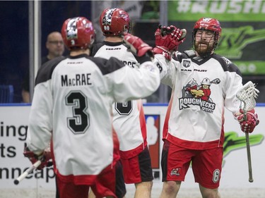 The Calgary Roughnecks celebrate a goal against Saskatchewan Rush in NLL action on Saturday, April 2nd, 2016.