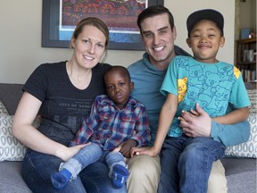 Andrea and Kyle Halstead with their 6-year-old son Noah, and their new adopted son, Seth, who arrived last Sunday from Congo after a long wait.