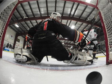 A shot from the Winnipeg Wild gets past Saskatoon Contacts goalie Isaac LaBelle in the first period during the Telus Cup West regional tournament final at Rod Hamm Memorial Arena on April 3, 2016.
