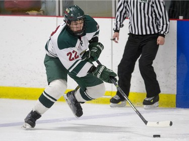 Winnipeg Wild defencemen Jett Woo moves the puck against the Saskatoon Contacts in the first period during the Telus Cup West regional tournament final at Rod Hamm Memorial Arena on Sunday, April 3rd, 2016.