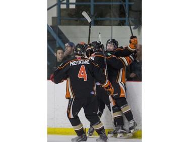The Saskatoon Contacts and their fans celebrate a goal against the Winnipeg Wild in the first period during the Telus Cup West regional tournament final at Rod Hamm Memorial Arena on Sunday, April 3rd, 2016