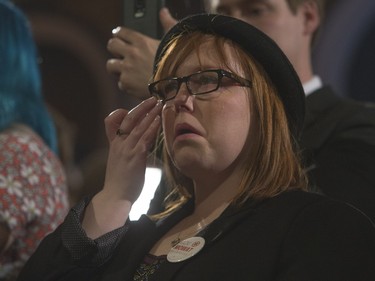 Tears run down for a Saskatchewan NDP supporter as various candidates speak at election headquarters for Saskatoon at the Bessborough Hotel, April 4, 2016.
