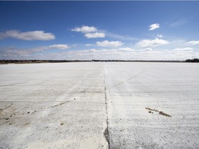 A large area of land covered in concrete that is believed to be the city's snow storage facility off of Dundonald Avenue, just west of the landfill.