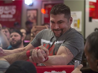 Clayton Turcotte battles during the World Armwrestling League on ESPN's 2016 Super Qualifier tournament at Bugsy's Sports Bar at Lawson Heights Mall on Saturday, April 9th, 2016.