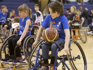 Players compete in a wheelchair basketball tournament at Bishop Mahoney school on Sunday, April 10th, 2016.