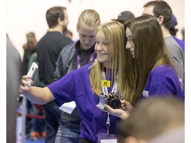 Teams from the same school cheer on fellow teammates and their robots during battle at the eighth annual Polytechnic Sumobot Robot Rumble, April 14, 2016.