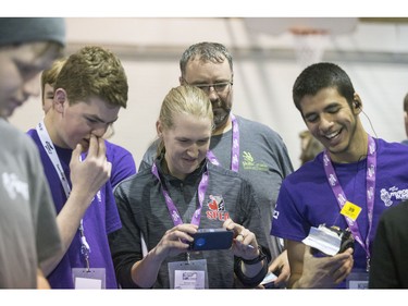 Teams from the same school cheer on fellow teamates cheer on their robots during battle during the 8th annual Polytechnic Sumobot Robot Rumble,  April 14, 2016.