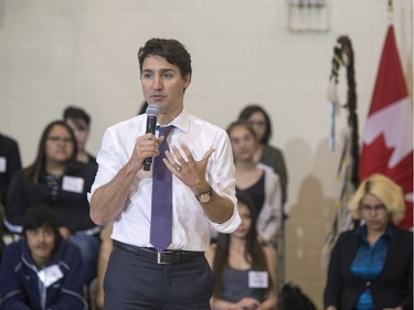 Prime Minister Justin Trudeau answers students' questions at Oskayak High School after touring the school and the Aboriginal Youth Entrepreneurship Program, April 27, 2016.