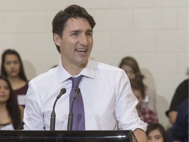 Prime Minister Justin Trudeau speaks at an assembly at Oskayak High School after touring the school and the Aboriginal Youth Entrepreneurship Program, April 27, 2016.