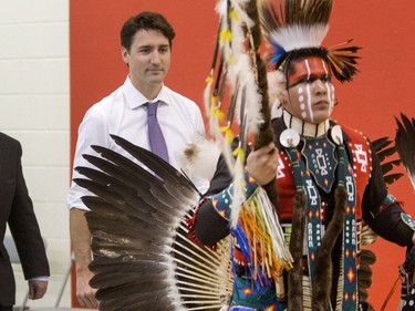 Prime Minister Justin Trudeau was at Oskayak High School walking in the grand entry into the school's gymnasium after a tour of the school and the Aboriginal Youth Entrepreneurship Program, April 27, 2016.