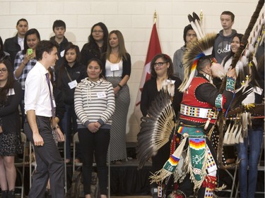 Prime Minister Justin Trudeau was at Oskayak High School walking in the grand entry into the school's gymnasium after a tour of the school and the Aboriginal Youth Entrepreneurship Program, April 27, 2016.