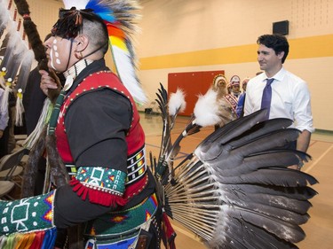 Prime Minister Justin Trudeau was at Oskayak High School walking in the grand entry into the school's gymnasium after a tour of the school and the Aboriginal Youth Entrepreneurship Program, April 27, 2016.