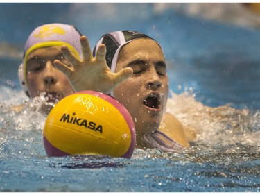 Under 16 player #11 Malachi Manitoba for Team Saskatchewan water polo team reaches for a ball passed to him in the offensive zone against Calgary Torpedos at the Shaw Centre in Saskatoon,  April 7, 2016. Saskatchewan is hosting the last series of the U16 National League Men's and Women's Western Conference championships.