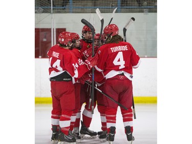 The Kenora Thistles celebrate a goal against the Saskatoon Contacts during the Telus Cup regional opener game at Rod Hamm Memorial Arena in Saskatoon, March 31, 2016.