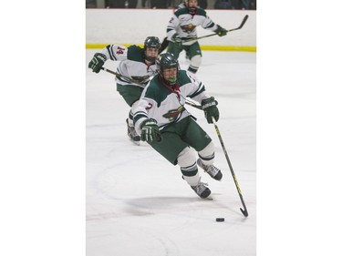 Winnipeg Wild forward Brett Namaka moves the puck against the Notre Dame Hounds during a Telus Cup west regional game at Rod Hamm Memorial Arena in Saskatoon, March 31, 2016.