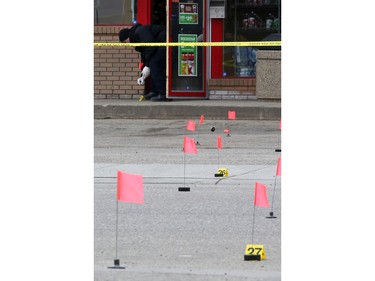 Detectives from the Saskatoon police major crimes and forensic identification units investigate after a man died in the Sutherland area on April 24 in Saskatoon.