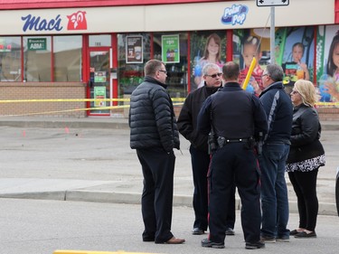 Detectives from the Saskatoon police major crimes and forensic identification units investigate after a man died in the Sutherland area on April 24 in Saskatoon.