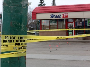 Detectives from the Saskatoon police major crimes and forensic identification units investigate after a man died in the Sutherland area on April 24 in Saskatoon.