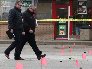 Detectives from the Saskatoon police major crimes and forensic identification units investigate after a man died in the Sutherland area on April 24 in Saskatoon.