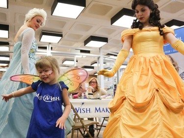 Kayla Ehart plays with princesses at the Make a Wish event at Royal University Hospital in Saskatoon, April 27, 2016.