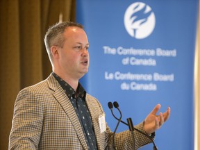 Ryan Walker, a professor of urban planning at the University of Saskatchewan, delivers his keynote address at the Conference Board of Canada's "Urban Centres as Engines of Growth" forum, held Monday in Saskatoon.