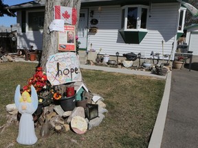 A memorial to Saskatoon native Dwayne Demkiw, who had been missing since May, 2015, is set up on Brandon Place in Saskatoon.