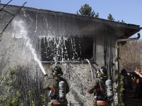 Firefighters deal with a house blaze at 1940 Easthill, Wednesday, April 20, 2016.