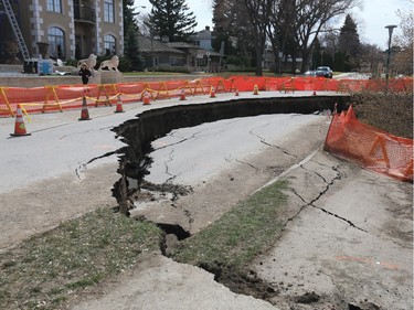 A land slump in the 800 block of Saskatchewan Crescent East, which has closed the road, has created a large sink hole, as seen April 25, 2016.