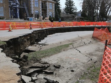 A land slump in the 800 block of Saskatchewan Crescent East, which has closed the road, has created a large sink hole, as seen April 25, 2016.