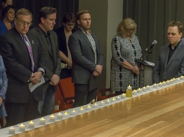 People gathered at Frances Morrison Central Library in Saskatoon for a National Day of Mourning Remembrance Ceremony for workers killed in the last year, April 28, 2016. Candles for workers killed were lit and wreaths laid at the City Hall memorial.