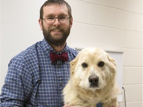 University of Saskatchewan professor Chris Clark with his dog Beef, who was a regular blood donor.