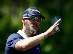 Canada's Olympic hopeful Graham DeLaet, the pride of Saskatchewan, waits to hits his tee shot on the sixth hole during the third round of the Shell Houston Open at the Golf Club of Houston on April 2, 2016 in Humble, Texas.