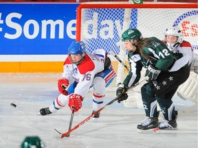 Kianna Dietz battles for the puck during the Saskatoon Stars game against Express du Richelieu on April 18, 2016 at the Esso Cup. (Andy Devlin, Hockey Canada images.)