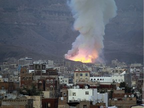 Smoke billows following an air-strike by Saudi-led coalition in May 2015, in Yemen's capital, Sanaa.