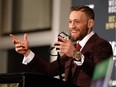 Conor McGregor speaks at a post-fight press conference after beating Jose Aldo in their featherweight title fight during UFC 194 at MGM Grand Garden Arena on December 12, 2015 in Las Vegas, Nevada