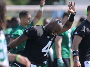 Quarterback Darian Durant stretches during day one of Riders training camp at Griffiths Stadium in Saskatoon on May 29, 2016. (Michelle Berg / Saskatoon StarPhoenix)