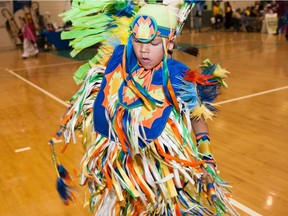 A young dancer takes part in festivities at the University of Saskatchewan Graduation Powwow on May 25, 2016. (Brandon Harder/Saskatoon StarPhoenix)