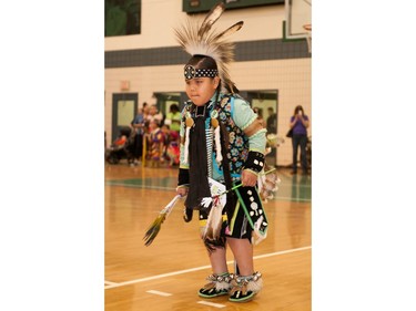 A young dancer takes part in festivities at the University of Saskatchewan Graduation Powwow on May 25, 2016.