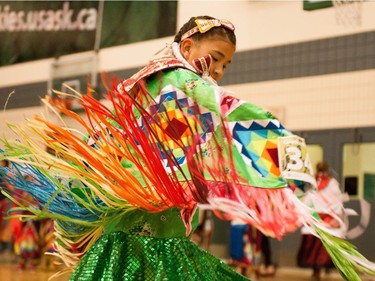 A young dancer takes part in festivities at the University of Saskatchewan Graduation Powwow on May 25, 2016.