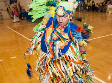 A young dancer takes part in festivities at the University of Saskatchewan Graduation Powwow on May 25, 2016.