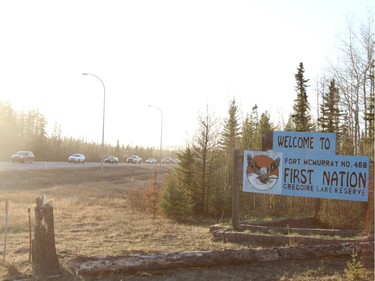 Cars flee from wildfires into Anzac via Highway 881 south of Fort McMurray Alberta on May 3, 2016.