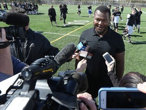 David Onyemata speaks to the media about being selected in the NFL draft, at University of Manitoba Bisons practice facility in Winnipeg on Sat., April 30, 2016.