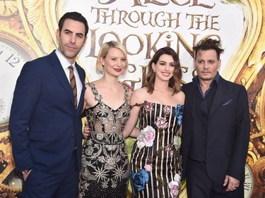 L-R: Actors Sacha Baron Cohen, Mia Wasikowska, Anne Hathaway and Johnny Depp attend Disney's "Alice Through the Looking Glass" premiere at the El Capitan Theatre on May 23, 2016 in Hollywood, California.