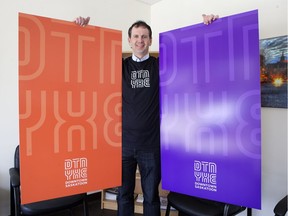 Downtown Saskatoon's executive director Brent Penner poses with the Business Improvement District's new branding materials.