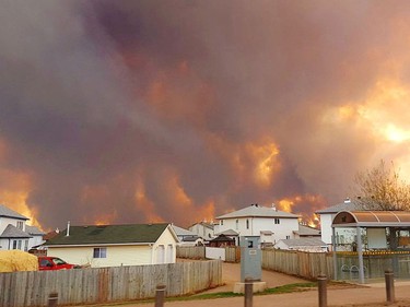 The forest fire burns through the area in Fort McMurray, Alberta, May 3, 2016.