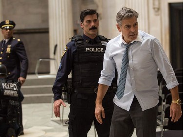 L-R: Giancarlo Esposito as Captain Marcus Powell, Anthony DeSando as Officer Benson and George Clooney as Lee Gates in TriStar Pictures' "Money Monster."