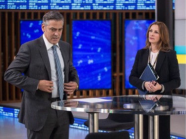 George Clooney as Lee Gates and Julia Roberts as Patty Fenn in TriStar Pictures' "Money Monster."